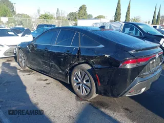 2022 Toyota Mirai XLE with VIN JTDAAAAA9NA007013, listed as a IAAI auction lot 41744965 with 23,243 mi miles and . Bid and sale history available at DreamBid. Image 14.
