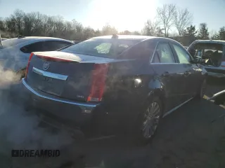 2013 Cadillac CTS with VIN 1G6DM5E36D0173553, listed as a Copart auction lot 84142504 with 100,703 mi miles and Salvage Title. Bid and sale history available at DreamBid. Image 3.