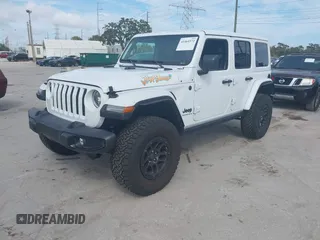 2023 Jeep Wrangler Sport S z VIN 1C4HJXDG5PW675463, wystawiony jako IAAI lot #41464572 z przebiegiem 3 379 mil mil oraz . Historia ofert i sprzedaży dostępna na DreamBid. Obrazek 2.