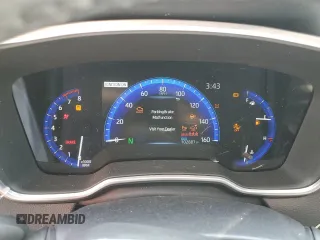 2022 Toyota Corolla Cross XLE with VIN 7MUDAABGXNV042443, listed as a Copart auction lot 57808565 with 102,887 mi miles and Salvage title. Bid and sale history available at DreamBid. Image 9.
