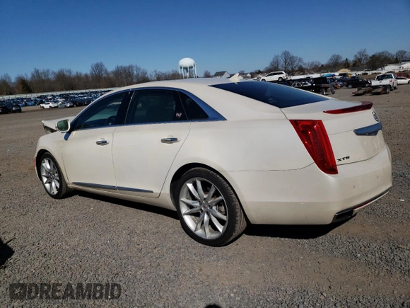 2013 Cadillac XTS Premium z VIN 2G61S5S34D9201773, wystawiony jako Copart lot #48572365 z przebiegiem 78 296 mil mil oraz Szkoda całkowita • Salvage title. Historia ofert i sprzedaży dostępna na DreamBid. Obrazek 2.