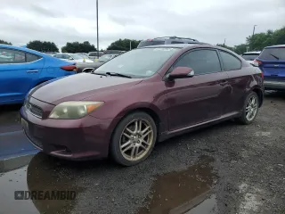 2007 Scion tC Spec with VIN JTKDE177570206512, listed as a Copart auction lot 61152865 with 180,338 mi miles and Salvage title. Bid and sale history available at DreamBid. Image 1.