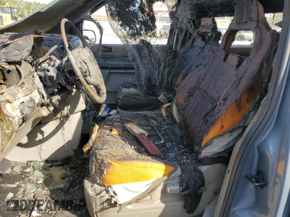 2004 Ford Freestar SE z VIN 2FMZA51674BB22374, wystawiony jako Copart lot #57065105 z przebiegiem Nie podano mil oraz Szkoda całkowita • Salvage title. Historia ofert i sprzedaży dostępna na DreamBid. Obrazek 7.