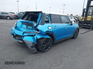 2015 MINI Hardtop 4 Door S with VIN WMWXU3C58F2B58305, listed as a IAAI auction lot 41413715 with 98,413 mi miles and . Bid and sale history available at DreamBid. Image 4.