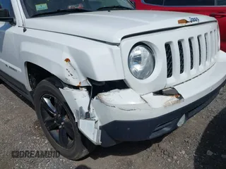 2015 Jeep Patriot Latitude with VIN 1C4NJRFB4FD394829, listed as a IAAI auction lot 42252571 with 113,071 mi miles and . Bid and sale history available at DreamBid. Image 6.