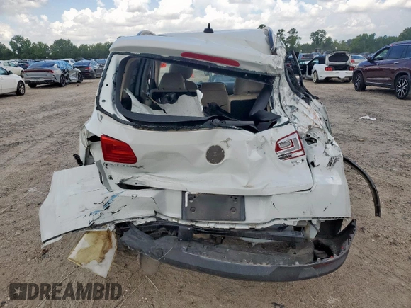 2017 Volkswagen Tiguan S with VIN WVGAV7AX4HW509023, listed as a Copart auction lot 63181405 with 114,006 mi miles and Salvage title. Bid and sale history available at DreamBid. Image 6.