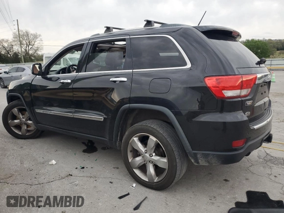 2012 Jeep Grand Cherokee Overland with VIN 1C4RJECT7CC311578, listed as a Copart auction lot 51905715 with 172,980 mi miles and Salvage Title. Bid and sale history available at carsss.com. Image 2.