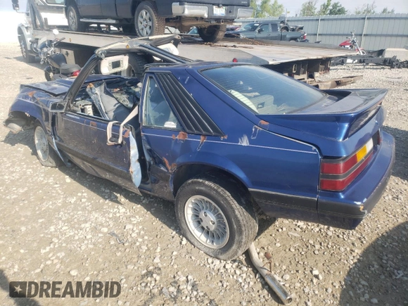 1985 Ford Mustang with VIN 1FABP28A4FF128833, listed as a Copart auction lot 61380294 with Not provided miles and Non repairable. Bid and sale history available at DreamBid. Image 2.