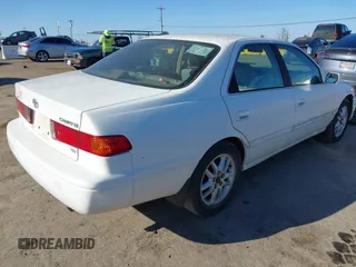 2001 Toyota Camry LE z VIN 4T1BF28K91U968760, wystawiony jako IAAI lot #41367655 z przebiegiem 161 389 mil mil oraz . Historia ofert i sprzedaży dostępna na DreamBid. Obrazek 4.