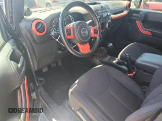 2013 Jeep Wrangler Sport with VIN 1C4AJWAG8DL693145, listed as a Copart auction lot 65591835 with 93,313 mi miles and Salvage title. Bid and sale history available at DreamBid. Image 8.