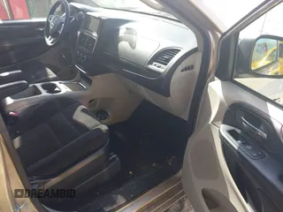 2014 Dodge Grand Caravan SXT with VIN 2C4RDGCG8ER244201, listed as a IAAI auction lot 42017091 with 161,653 mi miles and . Bid and sale history available at DreamBid. Image 5.