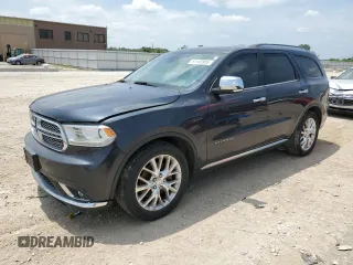 2014 Dodge Durango Citadel z VIN 1C4SDHET2EC360570, wystawiony jako Copart lot #61145805 z przebiegiem 142 694 mil mil oraz Czysty tytuł • Clean title. Historia ofert i sprzedaży dostępna na DreamBid. Obrazek 1.