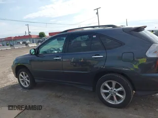 2008 Lexus RX with VIN 2T2HK31U28C063629, listed as a IAAI auction lot 42174790 with 204,595 mi miles. Bid and sale history available at carsss.com. Image 14.