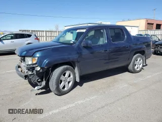2010 Honda Ridgeline RTL with VIN 5FPYK1F54AB002253, listed as a Copart auction lot 49992265 with 192,841 mi miles and Salvage Title. Bid and sale history available at carsss.com. Image 1.