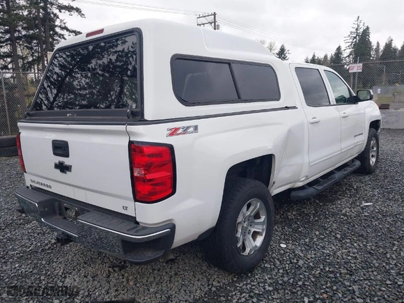 2015 Chevrolet Silverado 1500 LT with VIN 1GCUKREC7FF204237, listed as a IAAI auction lot 41903317 with 118,992 mi miles. Bid and sale history available at carsss.com. Image 4.