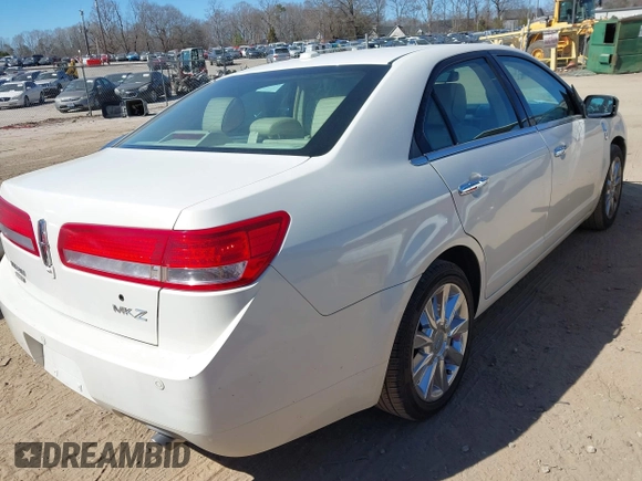 2012 Lincoln MKZ with VIN 3LNHL2GC4CR802198, listed as a IAAI auction lot 41703450 with 107,397 mi miles. Bid and sale history available at carsss.com. Image 4.