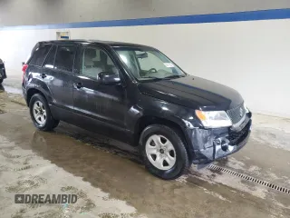 2009 Suzuki Grand Vitara with VIN JS3TE042694100010, listed as a Copart auction lot 56716225 with 148,495 mi miles and Salvage title. Bid and sale history available at DreamBid. Image 4.