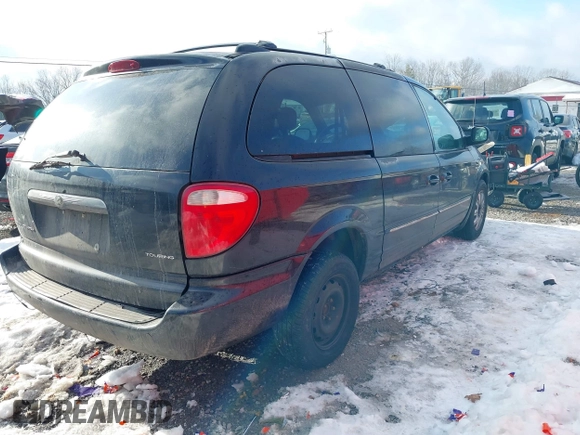 2004 Chrysler Town & Country Touring with VIN 2C4GP54L44R518281, listed as a IAAI auction lot 41397524 with 299,909 mi miles and . Bid and sale history available at DreamBid. Image 4.