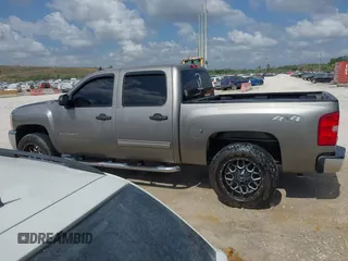 2012 Chevrolet Silverado 1500 LT with VIN 1GCPKSE7XCF183046, listed as a IAAI auction lot 41940526 with 261,566 mi miles and . Bid and sale history available at DreamBid. Image 14.