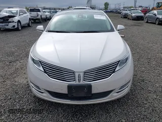 2015 Lincoln MKZ Hybrid with VIN 3LN6L2LUXFR606809, listed as a IAAI auction lot 41976918 with 169,999 mi miles and . Bid and sale history available at DreamBid. Image 13.