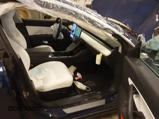 2018 Tesla Model 3 Long Range Battery with VIN 5YJ3E1EB7JF086201, listed as a IAAI auction lot 41965193 with 99,231 mi miles and . Bid and sale history available at DreamBid. Image 5.