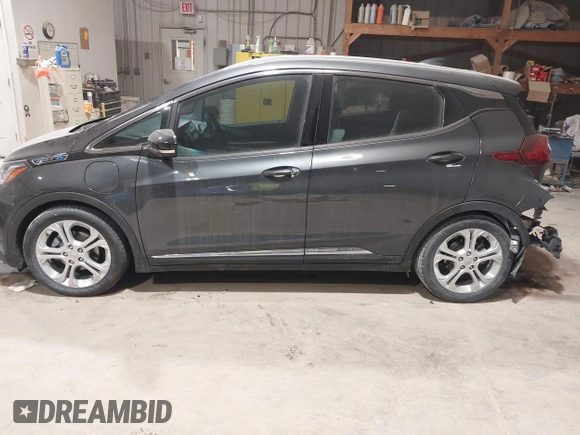 2021 Chevrolet Bolt EV LT z VIN 1G1FY6S05M4111315, wystawiony jako IAAI lot #41511422 z przebiegiem 14 433 mil mil oraz . Historia ofert i sprzedaży dostępna na DreamBid. Obrazek 13.