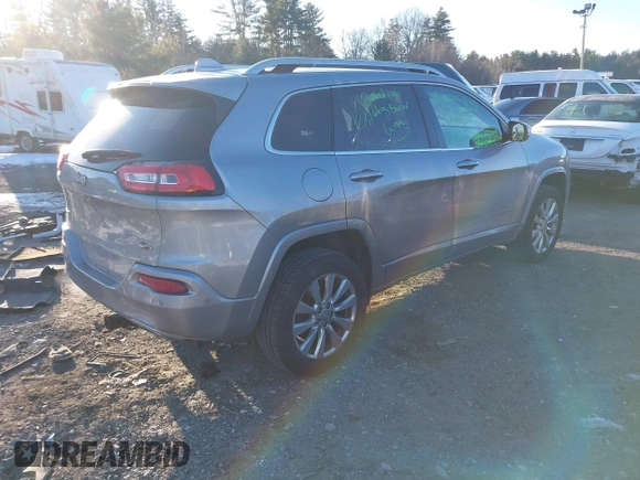 2017 Jeep Cherokee Overland z VIN 1C4PJMJS2HW599477, wystawiony jako IAAI lot #41335748 z przebiegiem 165 330 mil mil oraz . Historia ofert i sprzedaży dostępna na DreamBid. Obrazek 4.