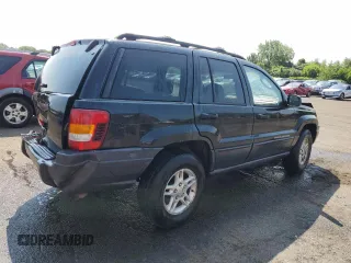 2004 Jeep Grand Cherokee Laredo z VIN 1J4GW48S24C217901, wystawiony jako Copart lot #60436675 z przebiegiem 263 837 mil mil oraz Szkoda całkowita • Salvage title. Historia ofert i sprzedaży dostępna na DreamBid. Obrazek 3.