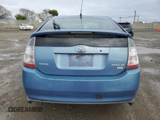 2005 Toyota Prius z VIN JTDKB20U153026520, wystawiony jako Copart lot #50978655 z przebiegiem 237 511 mil mil oraz Szkoda całkowita • Salvage title. Historia ofert i sprzedaży dostępna na DreamBid. Obrazek 6.