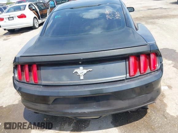2015 Ford Mustang V6 with VIN 1FA6P8AM3F5392995, listed as a IAAI auction lot 42063188 with 128,854 mi miles and . Bid and sale history available at DreamBid. Image 16.
