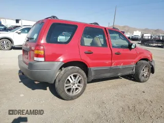2001 Ford Escape XLS with VIN 1FMYU02161KE97828, listed as a Copart auction lot 62542154 with 186,810 mi miles and Salvage Title. Bid and sale history available at carsss.com. Image 3.