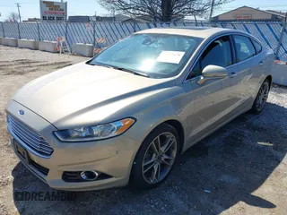 2015 Ford Fusion Titanium with VIN 3FA6P0D91FR236699, listed as a IAAI auction lot 41977478 with 203,394 mi miles. Bid and sale history available at carsss.com. Image 18.
