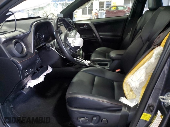 2018 Toyota RAV4 SE with VIN JTMJFREV1JD244469, listed as a Copart auction lot 62608485 with Not provided miles and Salvage title. Bid and sale history available at DreamBid. Image 7.