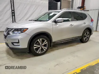 2017 Nissan Rogue SL with VIN 5N1AT2MTXHC875927, listed as a Copart auction lot 60327215 with 86,099 mi miles and Salvage title. Bid and sale history available at DreamBid. Image 1.