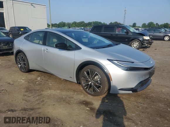 2024 Toyota Prius LE with VIN JTDADABU8R3020720, listed as a Copart auction lot 60815005 with 2,594 mi miles and Salvage title. Bid and sale history available at DreamBid. Image 4.