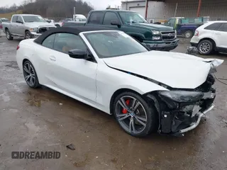 2023 BMW 4 Series M440i xDrive with VIN WBA63AT04PCL70876, listed as a IAAI auction lot 40777902 with 21,944 mi miles. Bid and sale history available at carsss.com. Image 1.