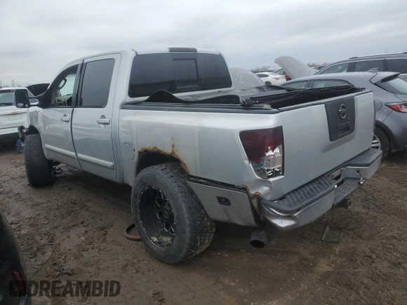 2004 Nissan Titan LE with VIN 1N6AA07A94N507274, listed as a Copart auction lot 47797205 with 144,021 mi miles and Salvage Title. Bid and sale history available at DreamBid. Image 2.