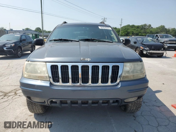2002 Jeep Grand Cherokee Laredo with VIN 1J4GW48S92C319161, listed as a Copart auction lot 59304035 with 257,907 mi miles and Salvage title. Bid and sale history available at DreamBid. Image 5.