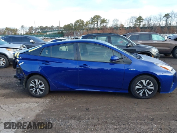 2016 Toyota Prius Two with VIN JTDKBRFU6G3519581, listed as a IAAI auction lot 41662291 with 125,802 mi miles and . Bid and sale history available at carsss.com. Image 14.