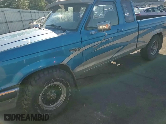 1991 Ford Ranger with VIN 1FTCR15T2MTA45652, listed as a Copart auction lot 76089874 with 90,947 mi miles and Salvage Title. Bid and sale history available at DreamBid. Image 10.