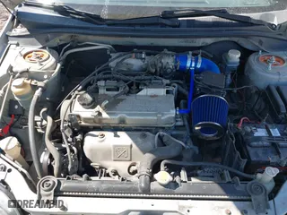 2003 Mitsubishi Lancer ES with VIN JA3AJ26E43U038813, listed as a IAAI auction lot 41778956 with 150,764 mi miles. Bid and sale history available at carsss.com. Image 10.