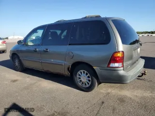 2001 Ford Windstar Wagon LX with VIN 2FMZA51441BA35669, listed as a Copart auction lot 73283214 with 240,538 mi miles and Salvage Title. Bid and sale history available at carsss.com. Image 2.