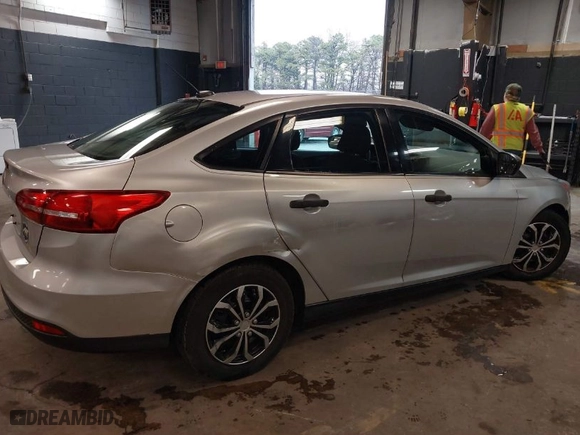 2016 Ford Focus S with VIN 1FADP3E22GL390039, listed as a IAAI auction lot 41958137 with 83,411 mi miles. Bid and sale history available at carsss.com. Image 6.