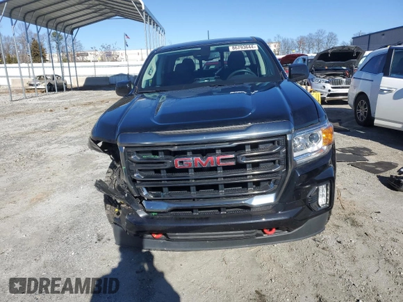 2021 GMC Canyon 4WD AT4 w/Leather with VIN 1GTG6FEN4M1155641, listed as a Copart auction lot 86793644 with 36,940 mi miles and Salvage Title. Bid and sale history available at carsss.com. Image 5.