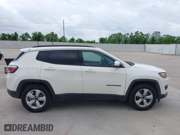 2019 Jeep Compass Latitude with VIN 3C4NJCBB9KT652088, listed as a IAAI auction lot 42162439 with 97,276 mi miles and . Bid and sale history available at DreamBid. Image 13.