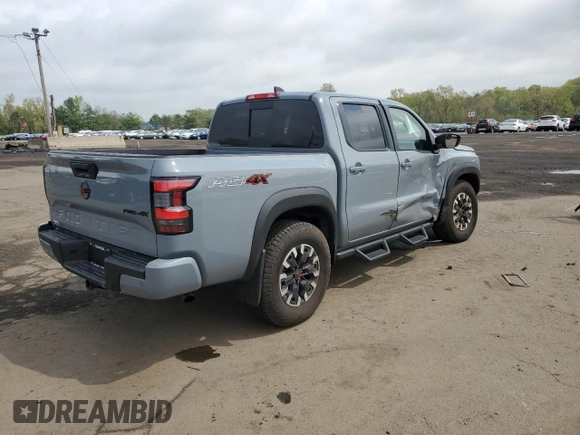 2023 Nissan Frontier Pro-4X with VIN 1N6ED1EK4PN672714, listed as a Copart auction lot 55557855 with 4,678 mi miles and Salvage title. Bid and sale history available at DreamBid. Image 3.