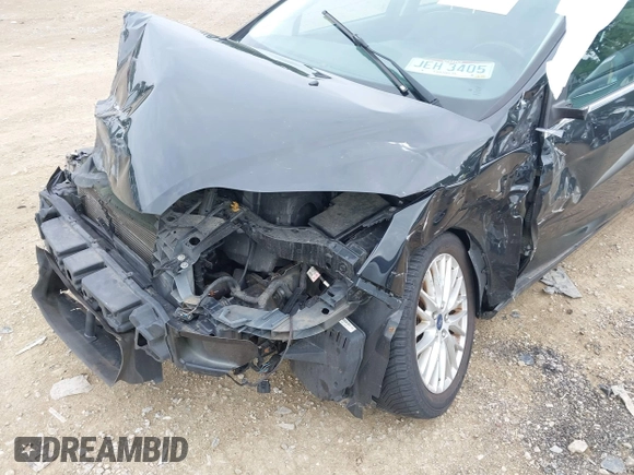 2014 Ford Focus Titanium with VIN 1FADP3N25EL194433, listed as a IAAI auction lot 42512912 with 105,355 mi miles and . Bid and sale history available at DreamBid. Image 6.