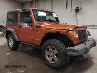 2011 Jeep Wrangler Rubicon with VIN 1J4BA6D15BL624268, listed as a IAAI auction lot 41430121 with 142,433 mi miles and . Bid and sale history available at carsss.com. Image 6.