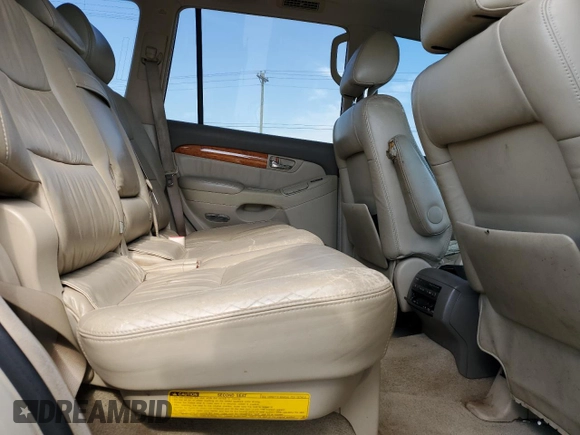 2003 Lexus GX 470 z VIN JTJBT20XX30010271, wystawiony jako Copart lot #52812575 z przebiegiem 291 394 mil mil oraz Szkoda całkowita • Salvage title. Historia ofert i sprzedaży dostępna na DreamBid. Obrazek 11.