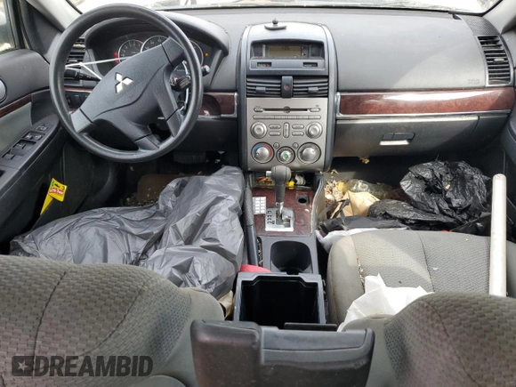 2009 Mitsubishi Galant ES z VIN 4A3AB36F39E029565, wystawiony jako Copart lot #52421295 z przebiegiem 213 344 mil mil oraz Czysty tytuł • Clean title. Historia ofert i sprzedaży dostępna na DreamBid. Obrazek 8.